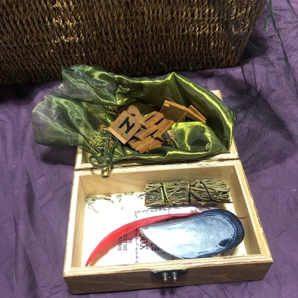 Wooden Box with wooden runes, smudge stick, shell,feather, and more